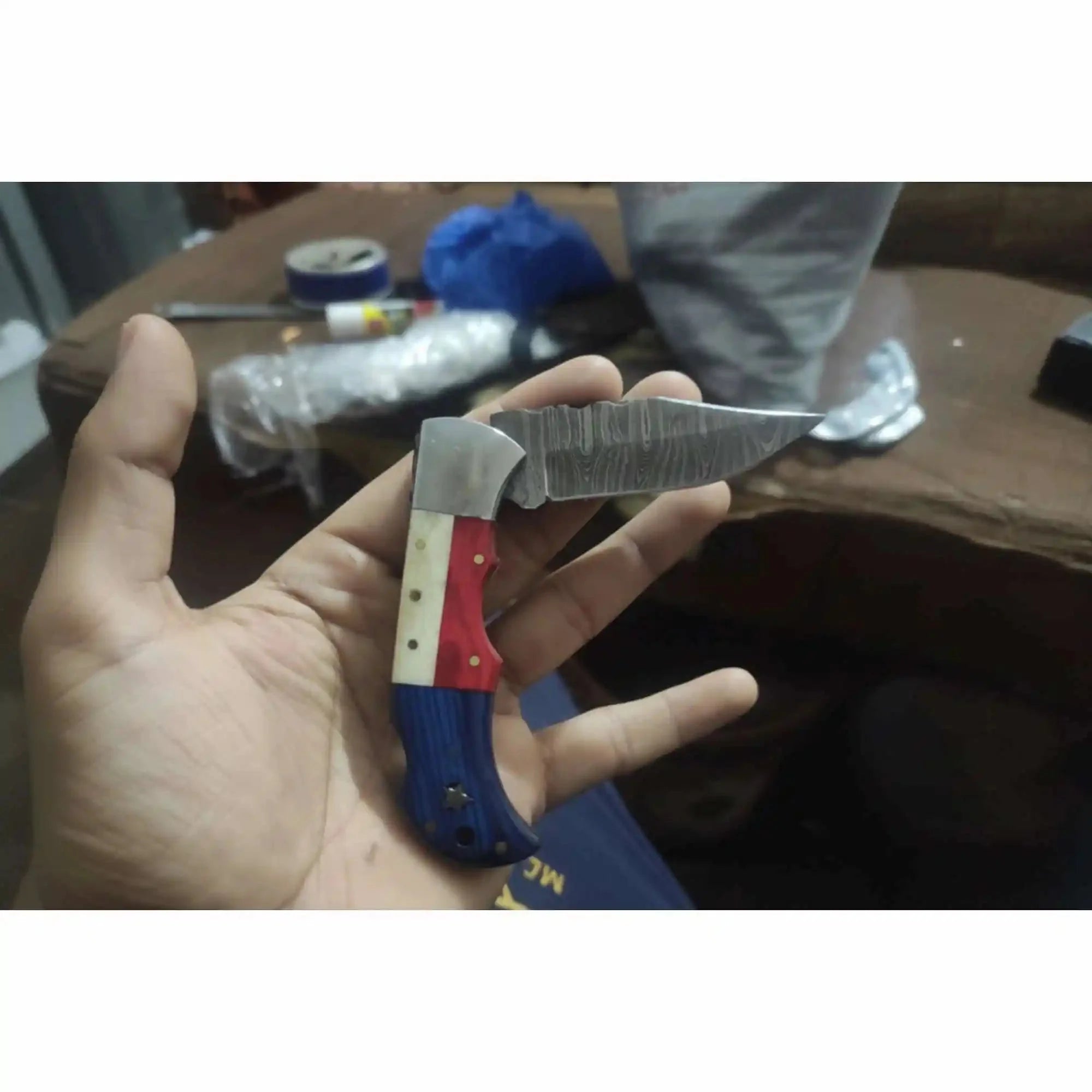 Handmade Damascus Folding Knife – Tricolor Resin Handle (Red, White & Blue) with Leather Sheath